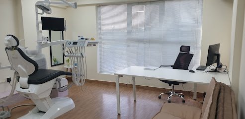 Dr. Taliya - Dentist