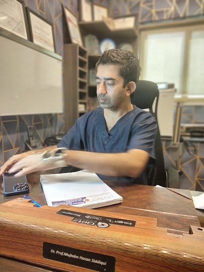 Dr. Qaisar Malik