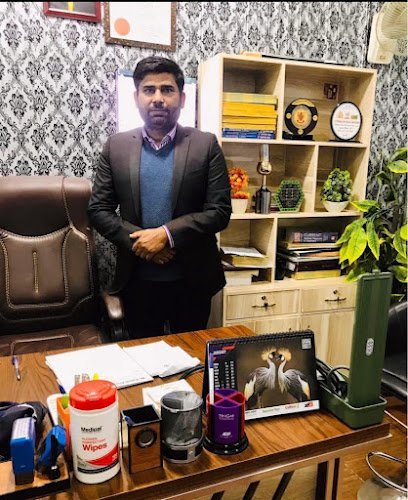 Dr. Faisal Aziz
