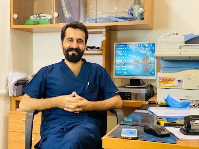 Dr. Malik Tahir